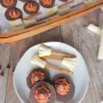 Harry Potter-themed snacks on a white plate and in a basket