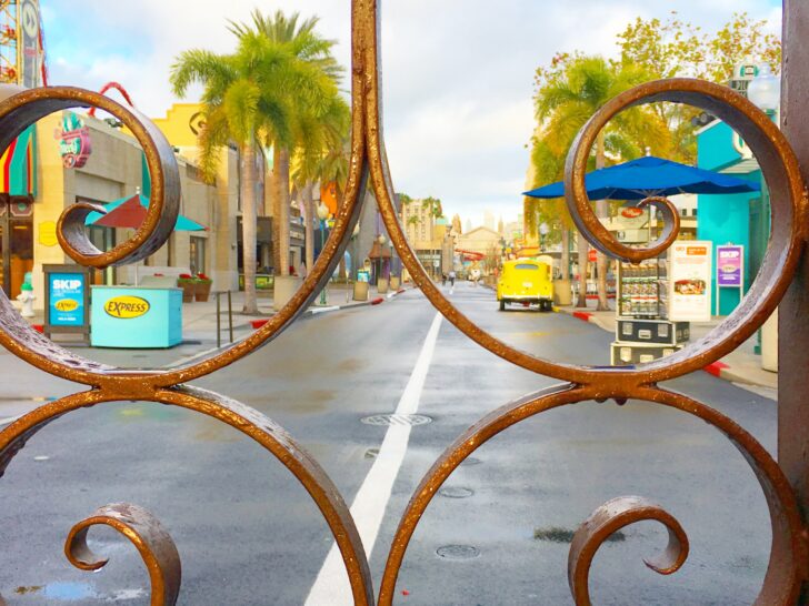 looking through entrance gate of Universal Studios Orlando into empty theme park