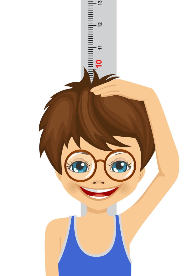 young boy with glasses measuring his height over white background