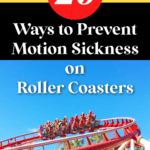 ride car on a red roller coaster track against blue sky background