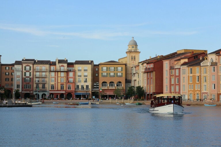 Loews Portofino Bay Hotel and lagoon with a universal studios transportation boat sailing away