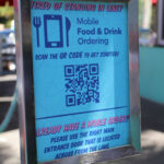 sign for mobile food and drink ordering with QR code