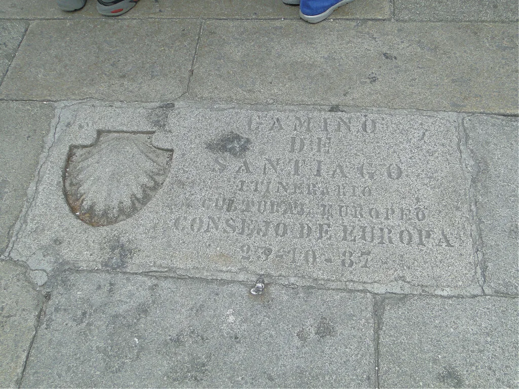 A sidewalk plaque in Asturias, Spain.