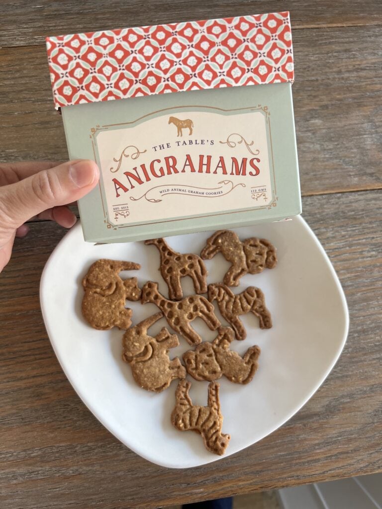 Explore Asheboro and indulge in delicious angora hams cookies sold by a person holding a plate.