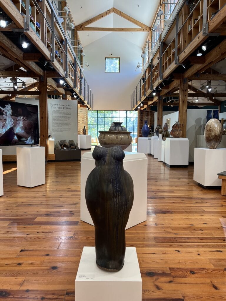 A museum with a vast collection of vases on display, perfect for visitors looking for things to do in Asheboro.