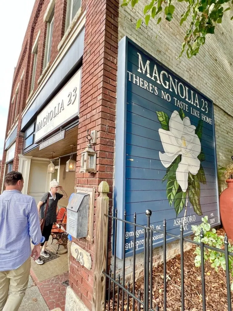 Looking for things to do in Asheboro? Look no further than Magnolia & Thomas, a charming brick building with a sign that says 